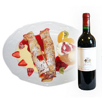 Sweet pancakes with fruits and bottle of red wine. Shop in Ukrainian Marriage Agency.