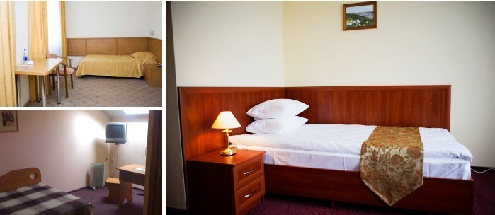Big and soft bed in front of the TV. Lutsk hotel room «silver» room for dating at the hotel